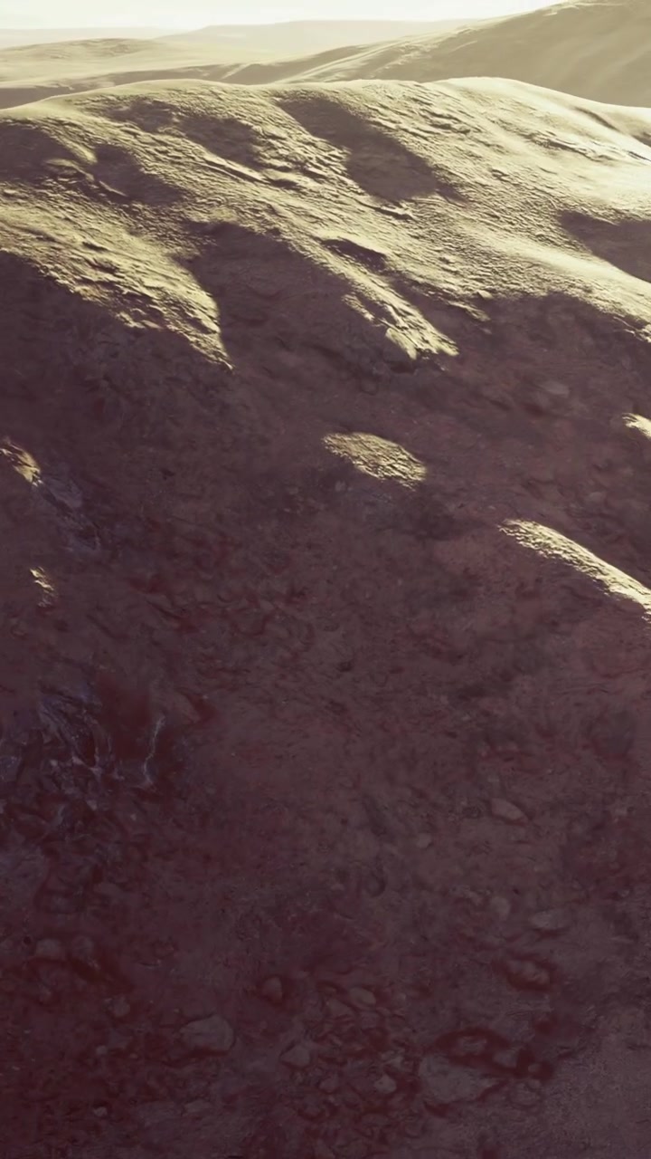 Exploring the rugged beauty of a sunlit desert landscape at dusk