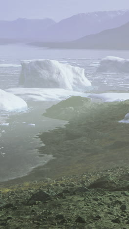 majestic icebergs floating serenely in a tranquil icy lagoon during dawn