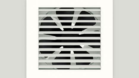 plastic black fan on white wall.