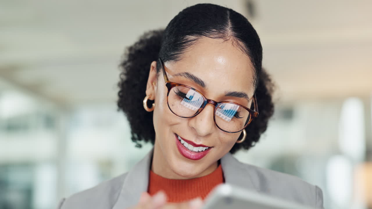 Businesswoman working on tablet in office