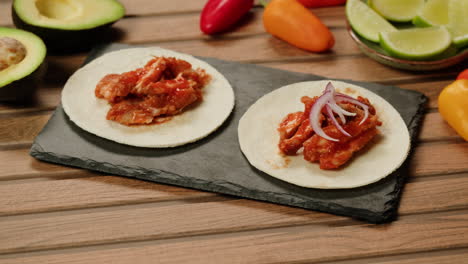 preparing chicken tacos