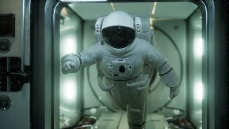 astronaut inside the orbital space station