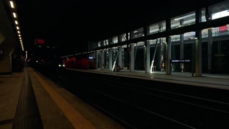 a train arrives at a turin station platform