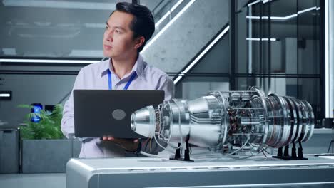 engineer analyzing jet engine design