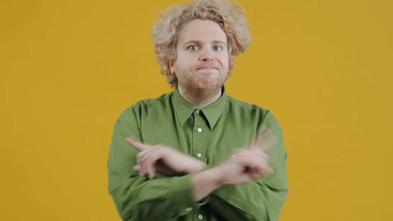 Man Making a Disapproving Gesture