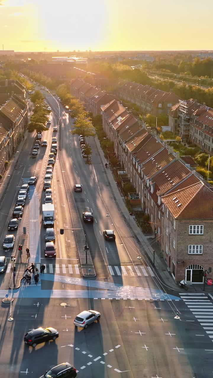 Aerial drone view of Vesterbro district in Copenhagen, Denmark at sunset. Vertical