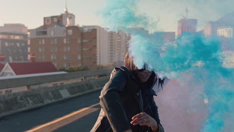 girl-dancing-with-blue-smoke-grenade-in-city-young-woman-dancer-celebrating-creative-expression-with-hip-hop-dance-in-street-slow-motion