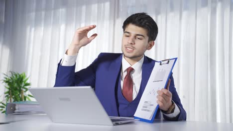 Young-entrepreneur-speaking-at-business-meeting-in-office.