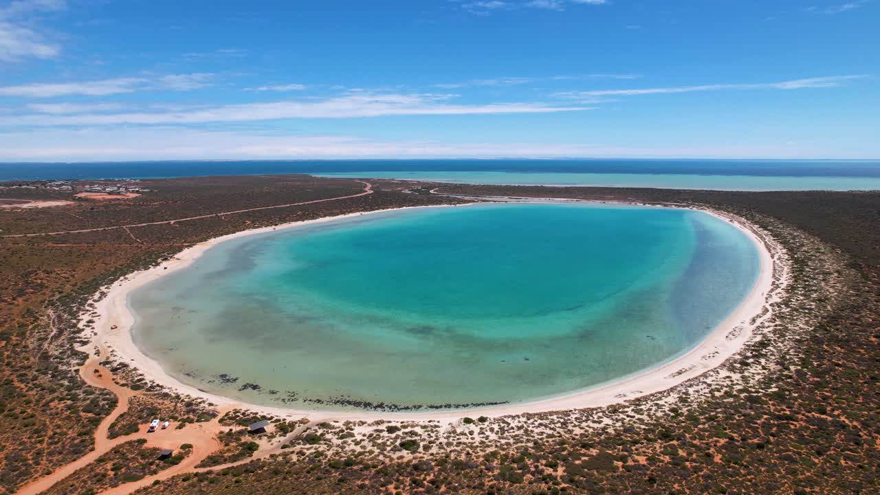 Aerial View of a Turquoise Lagoon on an Arid Coastline