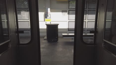 train doors closing at a train platform