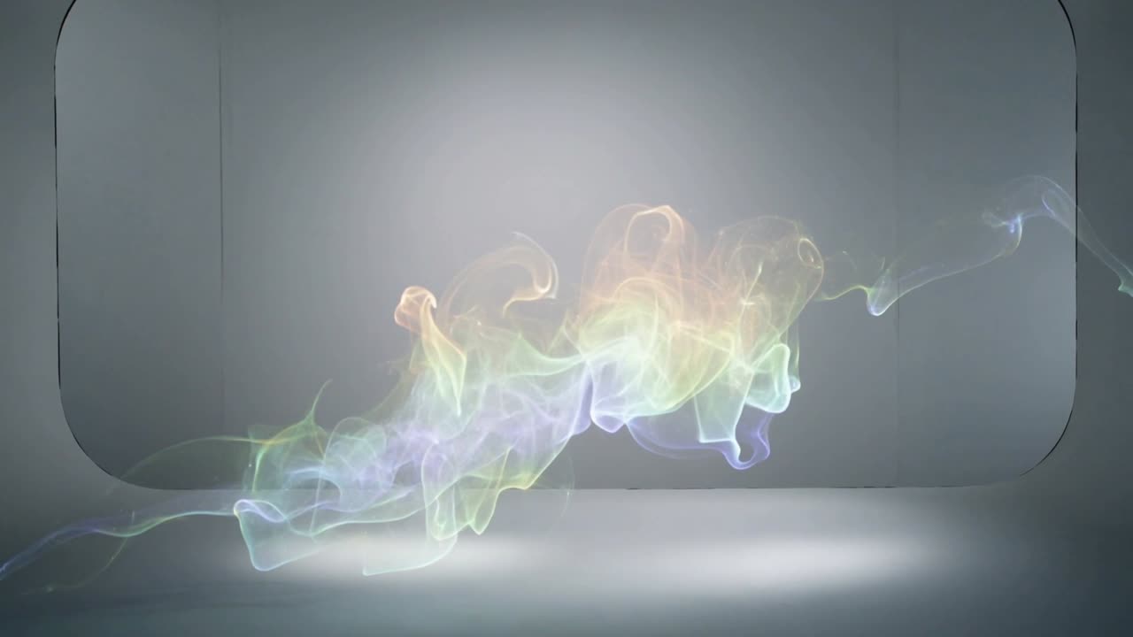 Emerging from backlight, rainbow smoke ribbon drifting across grey set with alcove and floor glow