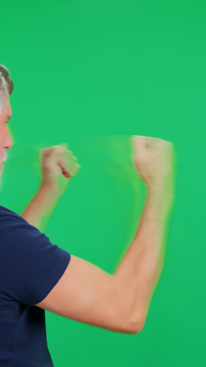Man Shadow Boxing and Punching on Green Screen