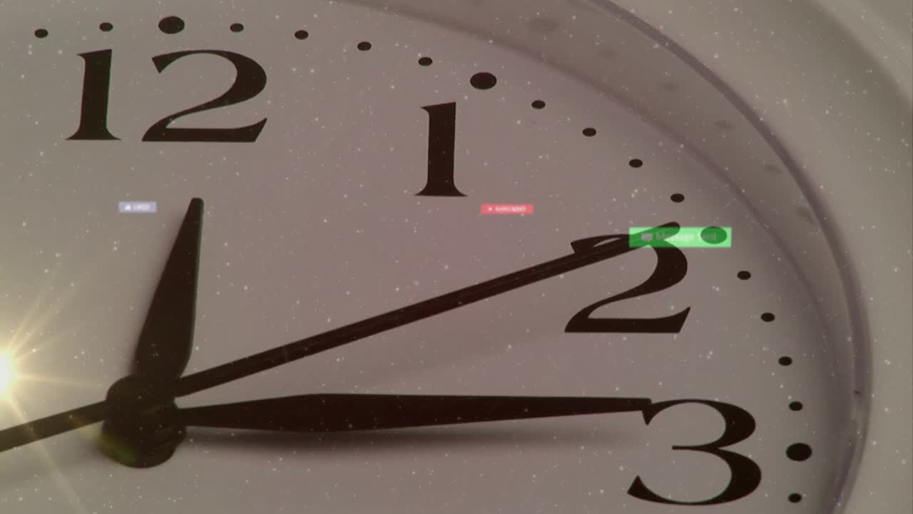 Analog wall clock showing engagement, lens flare initiating badges spawning and drifting clockwise