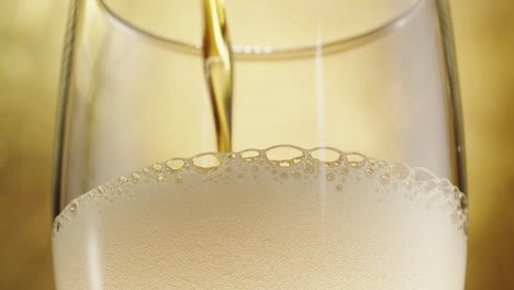 pouring beer into a glass