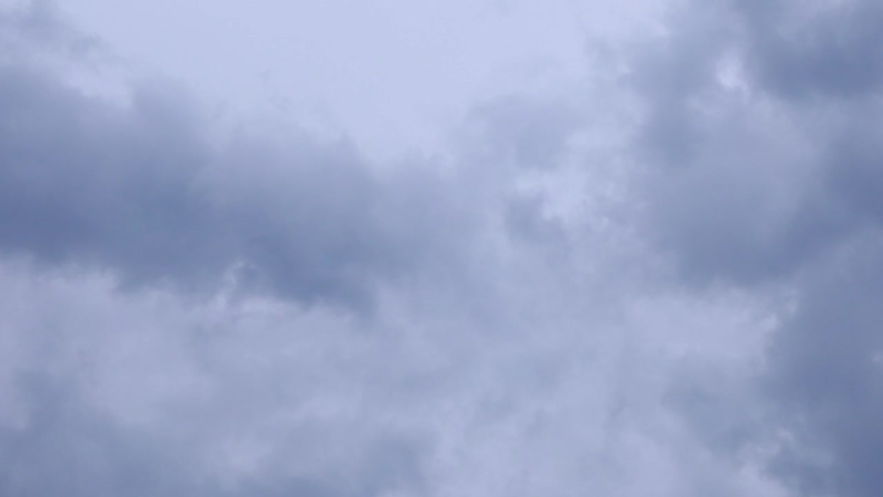 nd black cloud. Dark grey storm clouds. Dramatic sky. lighting in dark stormy cloudy. Beautiful nature time lapse storm clouds