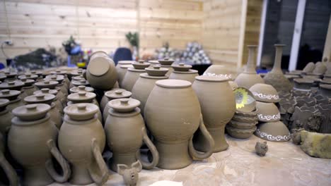 handmade pottery display in a workshop