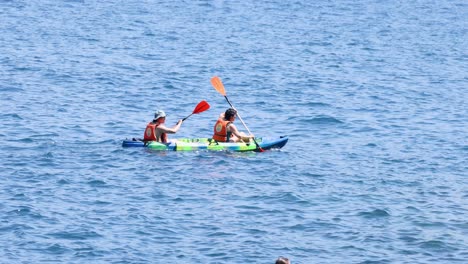 two people kayaking in sorrento, naples