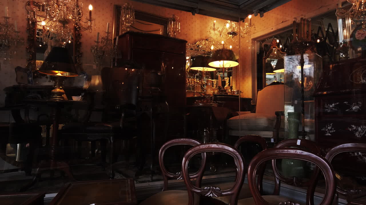 Window of antique furniture on display, wide shot