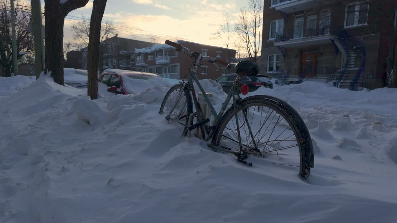 Bicycle abandoned under the winter snow, Vieux-Rosemont, Montreal