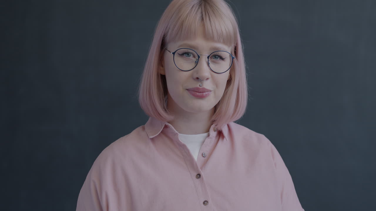 Happy Woman with Pink Hair and Glasses