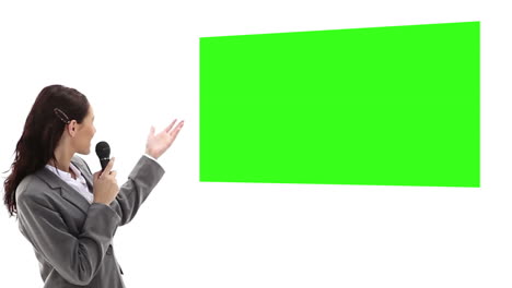 woman presenting chroma key