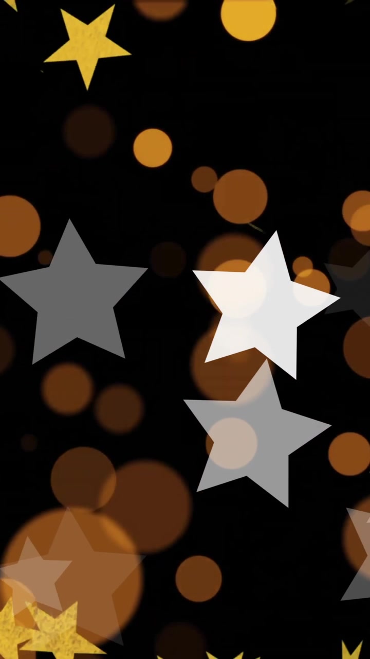 Animazione di stelle dorate e bianche, punti luce gialli e arancioni su sfondo nero