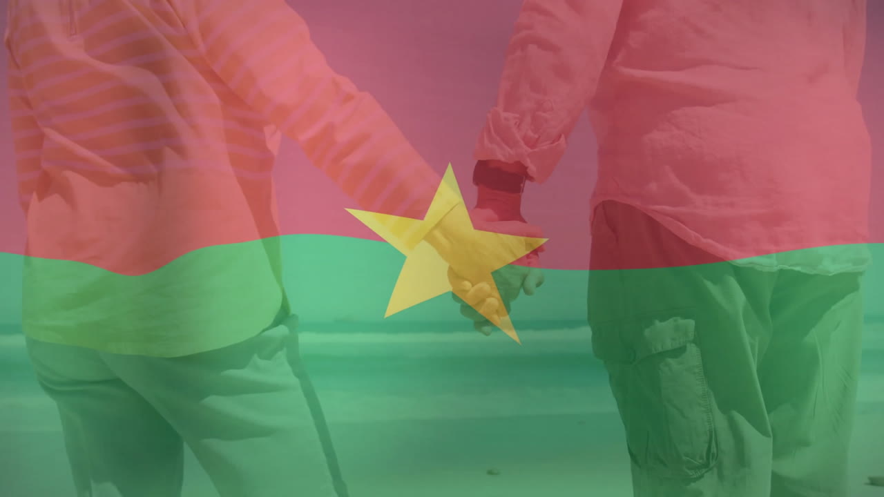 Holding hands, two people with Burkina Faso flag animation overlay