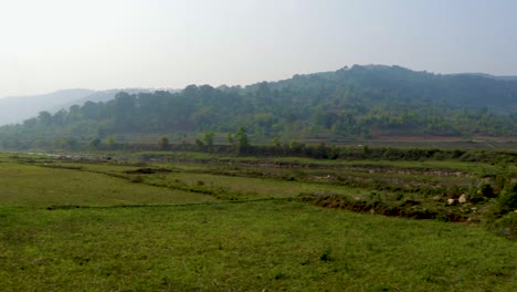 countryside agriculture farming fields with bright blue sky at morning from flat angle