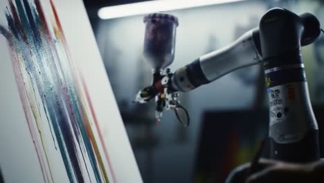 a robotic arm skillfully paints a vibrant abstract artwork in a well-lit studio.