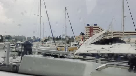 Hand-held-shot-from-inside-a-boat-with-rain-on-the-windows-in-the-Gibraltar-harbour