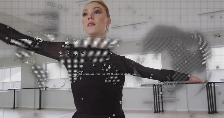 Dancer initiating spin showcasing technology integration with animated world map and code overlay