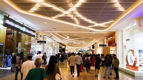 crowded mall with shoppers and bright lights