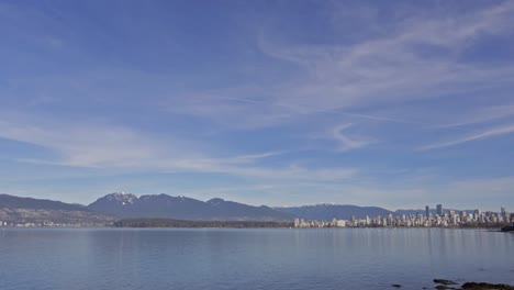 vancouver, bc british columbia, canada daytime timelapse, downtown looking at stanley park, downtown and the north shore mountains