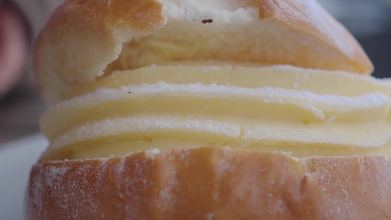 Close-up of a Cream-Filled Brioche Bun