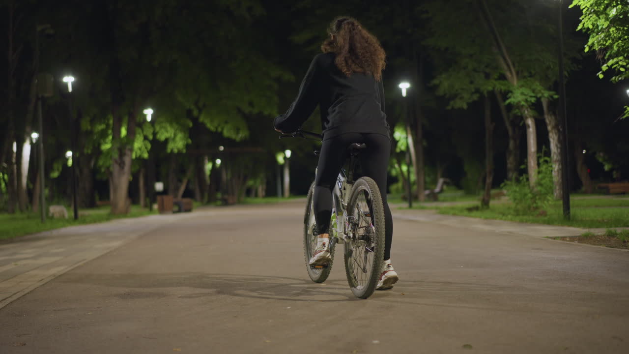 Cycling Under Moon, Moonlit Journey Highlights Thrill Of Unfettered Riding Experience, Recreational Cycling At Night Reflects Liberation And Adventure Under Glowing Lunar Illumination
