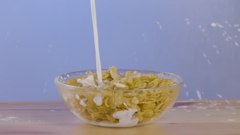 pouring milk into cereal bowl