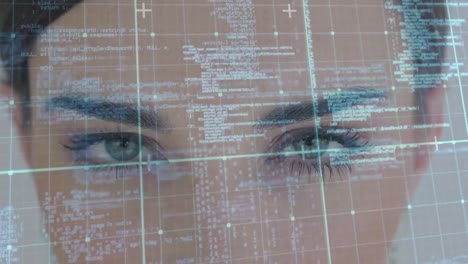 animation of data processing over caucasian woman's face and grid