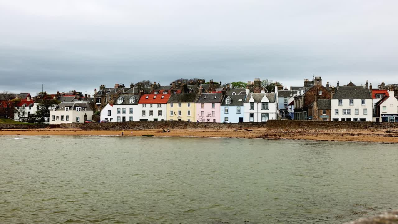 young family playing on the beaches at Anstruther during summer