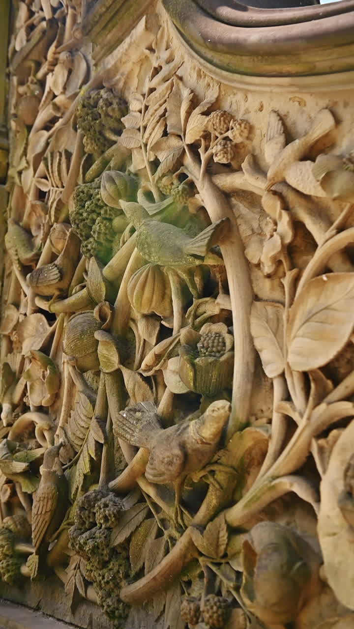 New York, USA, 8 July 2025: Discover NYC's stone carvings. Visitors admire the detailed stone sculptures at a historic site in New York, showcasing beautiful floral designs