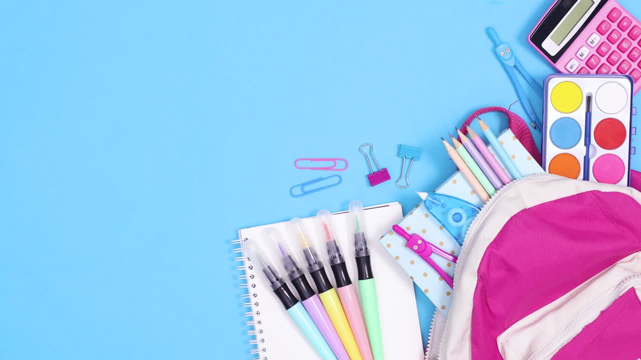 Back to school stationery appear from backpack on right side of blue theme. Stop motion