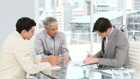 competitive businessmen having a meeting