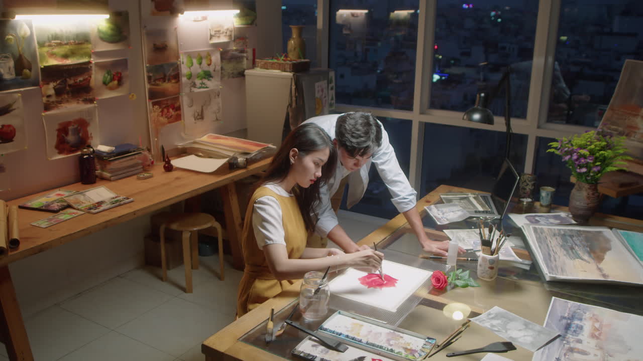 Woman Drawing Picture with Help on Teacher at Painting Class