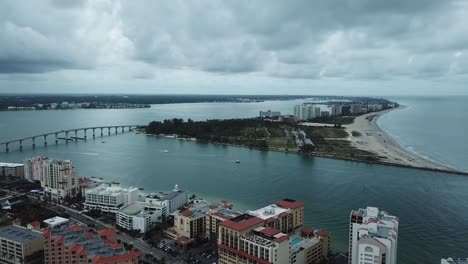 clearwater, florida, causeway bridge,  hotels rain clouds aerial, forward pan