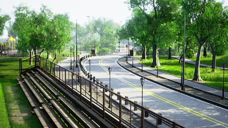 tranquil park pathway surrounded by lush trees and bright sunshine