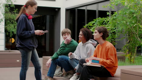 multiethnic friends in university campus.