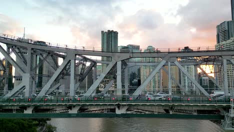 drone tracking southbound traffic at peak hour on the story bridge in brisbane in the state of queensland in australia