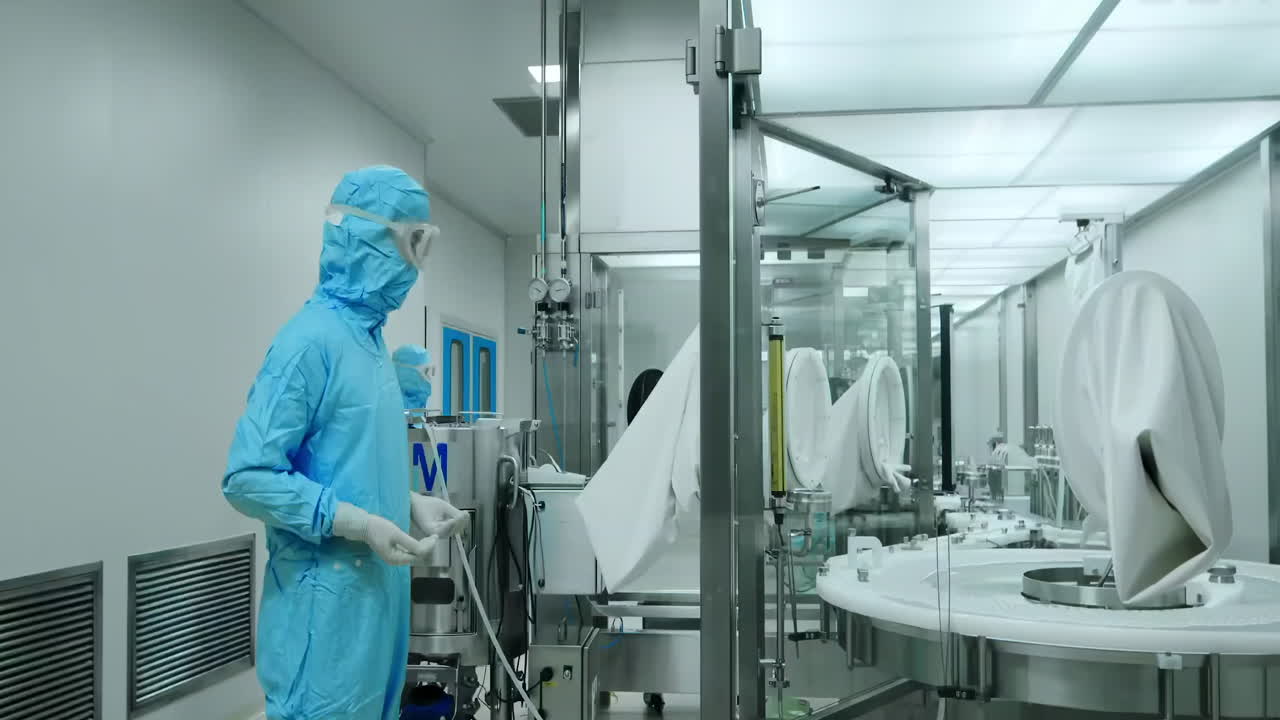 Medical scientist team loading tissue culture flask sample to centrifuge machine to analyzing. Advanced research lab with modern equipment. Drug vaccine development in professional biotechnology lab