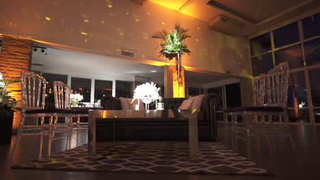 candlelit wedding reception hall with floral arrangements and soft glowing atmosphere