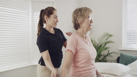 physical therapy session for elderly woman