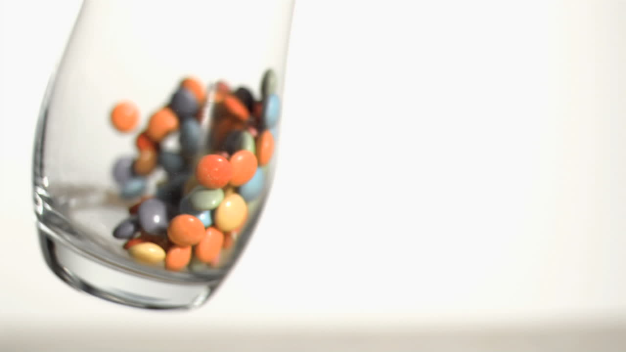 los caramelos girando en cámara súper lenta